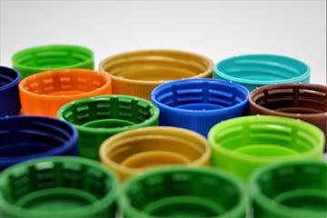 Arranged bottle caps with different color. and shape