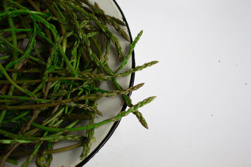 asparagus on the plate on white background