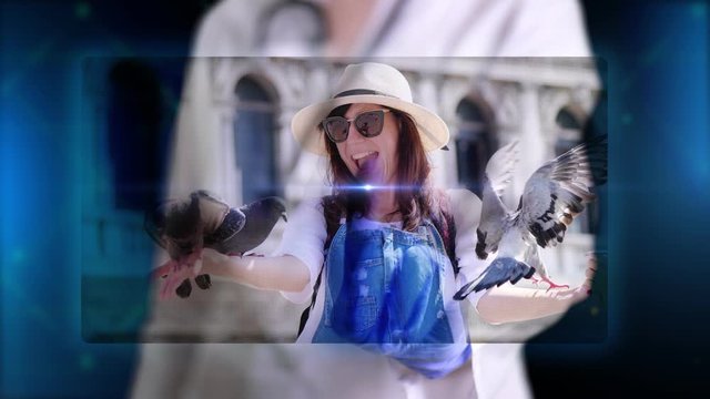 Doctor presents hologram image of woman having fun with pigeons in Venice. Doctor makes freeze frame, puts stamp - trip canceled. Prohibitions during coronavirus epidemic,