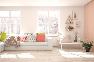 White living room with sofa and winter landscape in window. Scandinavian interior design. 3D illustration