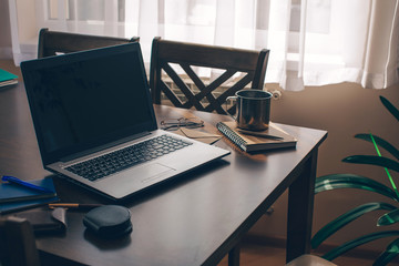 laptop on table. Office. Laptop. Background. Light. 