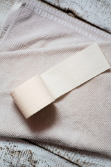 A roll of toilet paper on a towel