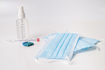 surgical mask medicinal capsules and thermometer