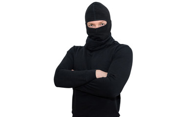 a man in balaclava with crossed arms isolated on white backgound