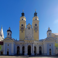 Cathedral of Bressanone, Brixen, in the morning light and in the blue sky.