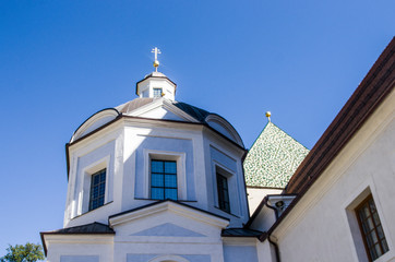 European style mountain church under blue sky