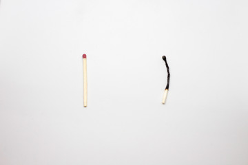 Two whole matches on a white background