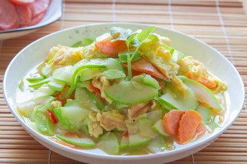 Stir fry eggs with zucchini close up