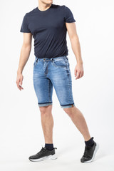 Obraz premium a man in denim shorts on a white background