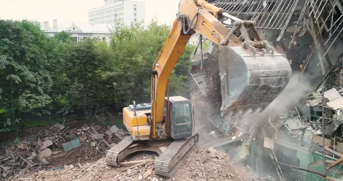 excavator machine at demolition on construction site