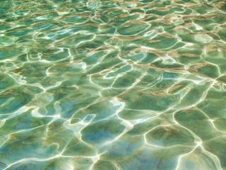Dazzling sparkling sea watertable background of one of the most popular beaches in Mallorca, the beach Cala Mondrago, Mallorca, Spain
