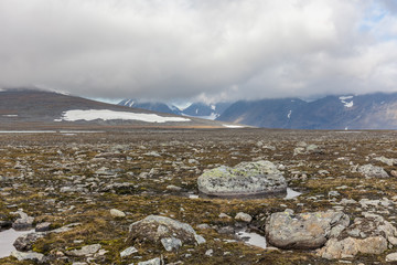 View of the valley. Northern Sweden, Sarek National Park in stormy weather. selective focus