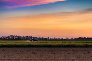 field watering sunset