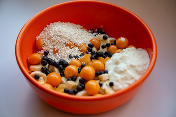 Plate of chopped fruits for breakfast