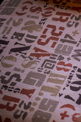 Number and letter fabric texture background