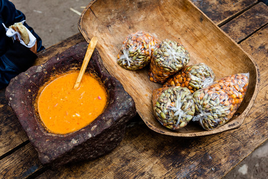 Portions of roasted corn with zambo