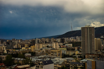 Naklejka premium Dramatic sky over Tbilisi city centre