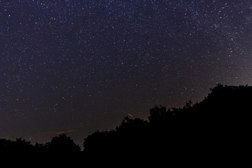 Fototapeta premium ciel étoile filante nuit noir