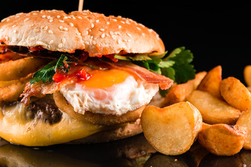 homemade burger with egg and bacon