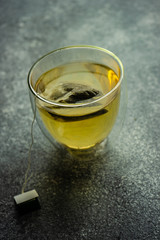 Glass of green tea in glass cup