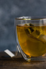 Glass of green tea in glass cup