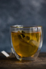 Glass of green tea in glass cup