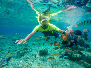 Bunaken Indonesi, June 03 2020: Tourist snorkeling in the tropical water. 