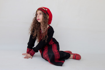 Arabian adorable girl in bedouin traditional cloths 