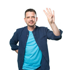 Young man wearing a blue outfit. Doing four number gesture.