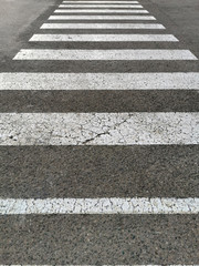 pedestrian crossing in perspective stripes horizontally, white strip, permission