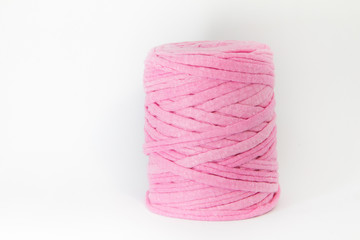 pink fabric with which to make fabrics and crafts on white background. Right space free
