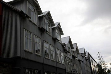Fototapeta na wymiar Reykjavik / Iceland - August 15, 2017: Houses in Reykjavik city, Iceland, Europe