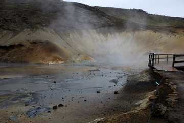 Fototapeta na wymiar Krisuvik / Iceland - August 15, 2017: Geothermal manifestations in Krisuvik geothermal area, Iceland, Europe