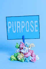 Writing note showing Purpose. Business concept for The reason for which something is done or...