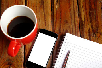 Coffee cup and equipment on work table 
