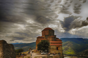 View of Jvari monastery, a 6th-century Orthodox monastery on a rocky mountaintop above the Old city...