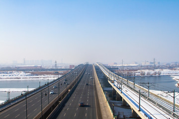 Newly paved straight highway in winter