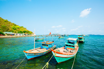 Naklejka na ściany i meble Boats on the sea in Nam Du island, Kien Giang, Vietnam. Near Phu Quoc island 