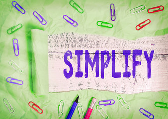 Word writing text Simplify. Business photo showcasing make something simpler or easier to do or...