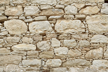Fragment of an old wall in the village of Omodos. Cyprus