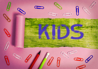 Conceptual hand writing showing Kids. Concept meaning a young being below the age of puberty or...