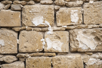 Antique stone wall with traces of stucco. Nicosia. Cyprus.