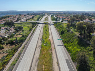 Fototapeta na wymiar Aerial view of highway, freeway road with vehicle in movement. California, USA.