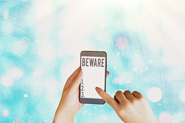 Conceptual hand writing showing Beware. Concept meaning used to warn someone to be very careful...
