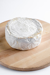 Pieces of  Camembert  cheese at white background, isolated