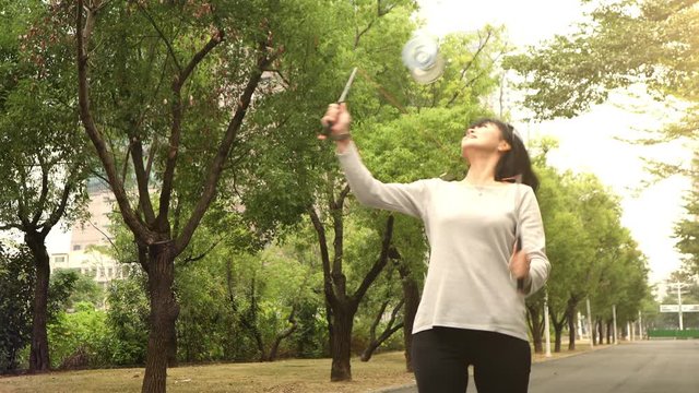 Taiwanese woman playing with a Chinese Yo-Yo
