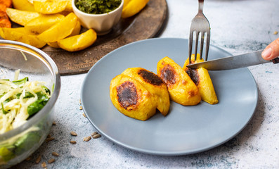 Baked grilled potato slices. Vegan vegetables food lunch snack. 