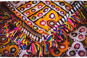 Patchwork quilt in kutch Gujarat india,needlework embroidery art work,as a kind of needlework, creativity and art.best indian traditional embroidery art. Threads for embroidery,selective focus