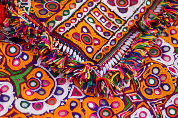 Threads for embroidery,multi color embroidery art,handmade stitch pattern close up view, Embroidery vintage style ,Indian patchwork carpet in india,craftsman embroidering cloth in traditional Indian