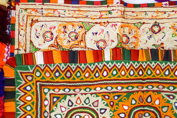  Colorful Peruvian handicraft embroidered flowers on textile, embroidery handicrafts close up view and selective focus,handmade ukrainian embroidery ,mirror embroidery art in kutch kutch Gujarat india